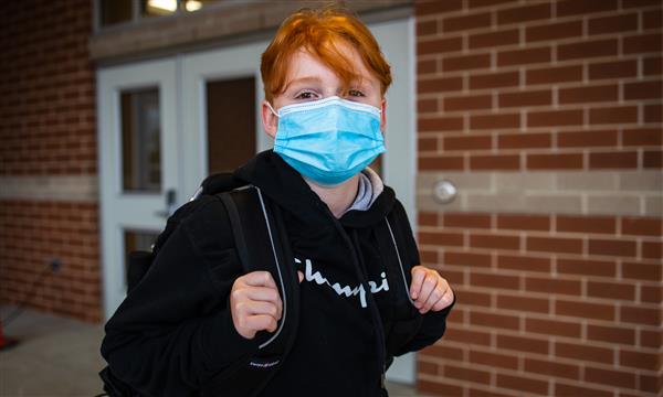 student smiles on first day of school
